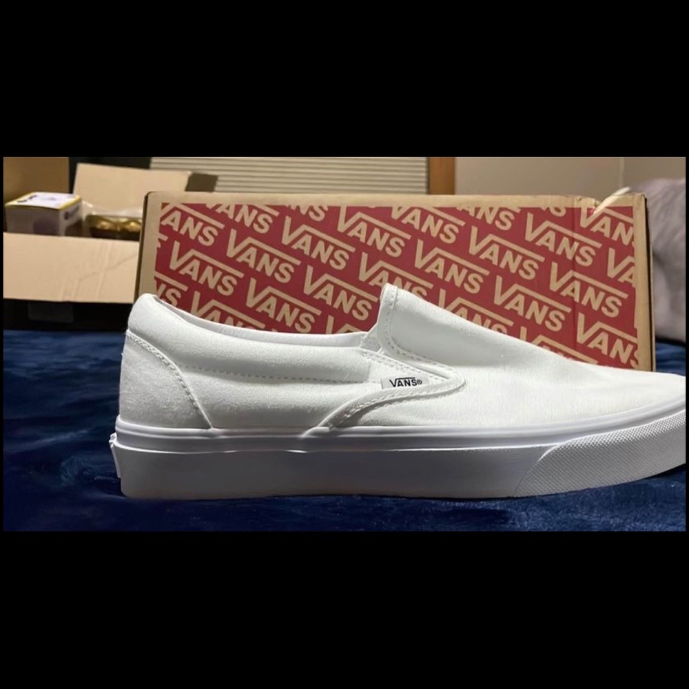 White slip on vans
